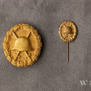 Wound Badge 1918 in gold  Counter-relief    Set with dress miniature