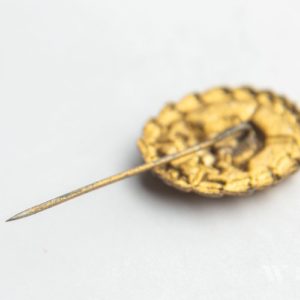 Wound Badge 1918 in gold  Counter-relief    Set with dress miniature