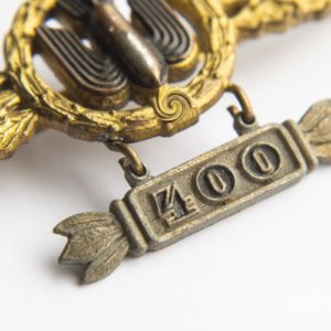 Bomber Badge in gold, with a 