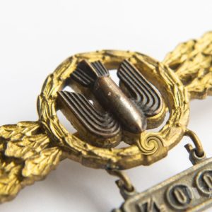 Bomber Badge in gold, with a 