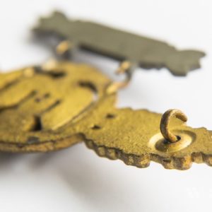 Bomber Badge in gold, with a 