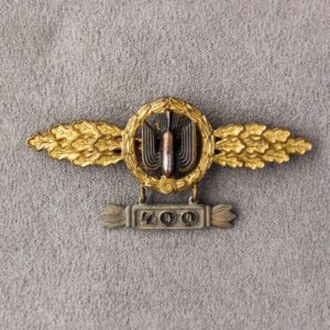 Bomber Badge in gold, with a 