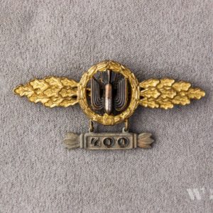 Bomber Badge in gold, with a 