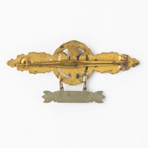 Bomber Badge in gold, with a 