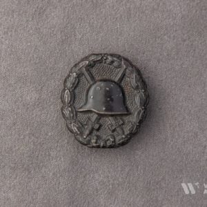 Wound Badge 1918 in black Counter-relief D.R.G.M. mark on the catch hook