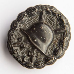 Wound Badge 1918 in black Counter-relief D.R.G.M. mark on the catch hook