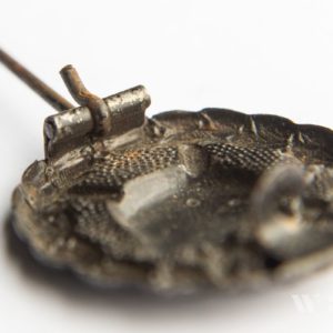 Wound Badge 1918 in black Counter-relief D.R.G.M. mark on the catch hook