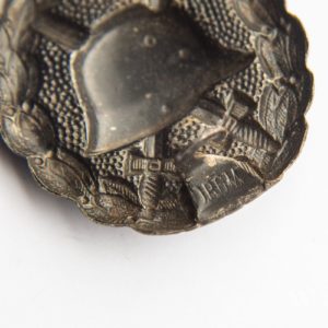 Wound Badge 1918 in black Counter-relief D.R.G.M. mark on the catch hook