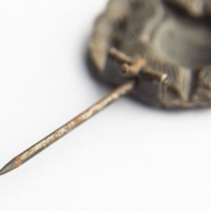 Wound Badge 1918 in black Counter-relief D.R.G.M. mark on the catch hook