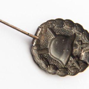 Wound Badge 1918 in black Counter-relief D.R.G.M. mark on the catch hook