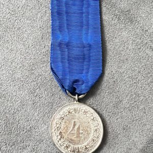 4-Year Long Service Award with an imperial eagle clasp for the Army and Navy   