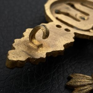 Bomber Badge in gold, with a 