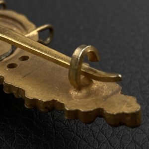 Bomber Badge in gold, with a 