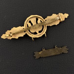 Bomber Badge in gold, with a 