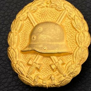 Wound Badge 1918 in gold  Counter-relief    D.R.G.M. mark on the catch hook