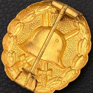 Wound Badge 1918 in gold  Counter-relief    D.R.G.M. mark on the catch hook