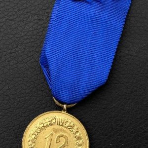 12-Year Long Service Award with an imperial eagle clasp for the Army and Navy   