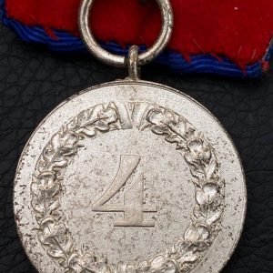 4-Year Long Service Award with an imperial eagle clasp for the Army and Navy   Single medal bar