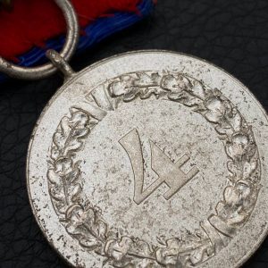 4-Year Long Service Award with an imperial eagle clasp for the Army and Navy   Single medal bar