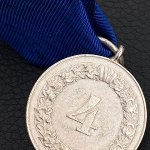 4-Year Long Service Award in the Wehrmacht  Mint The sign is made of a magnetic alloy.